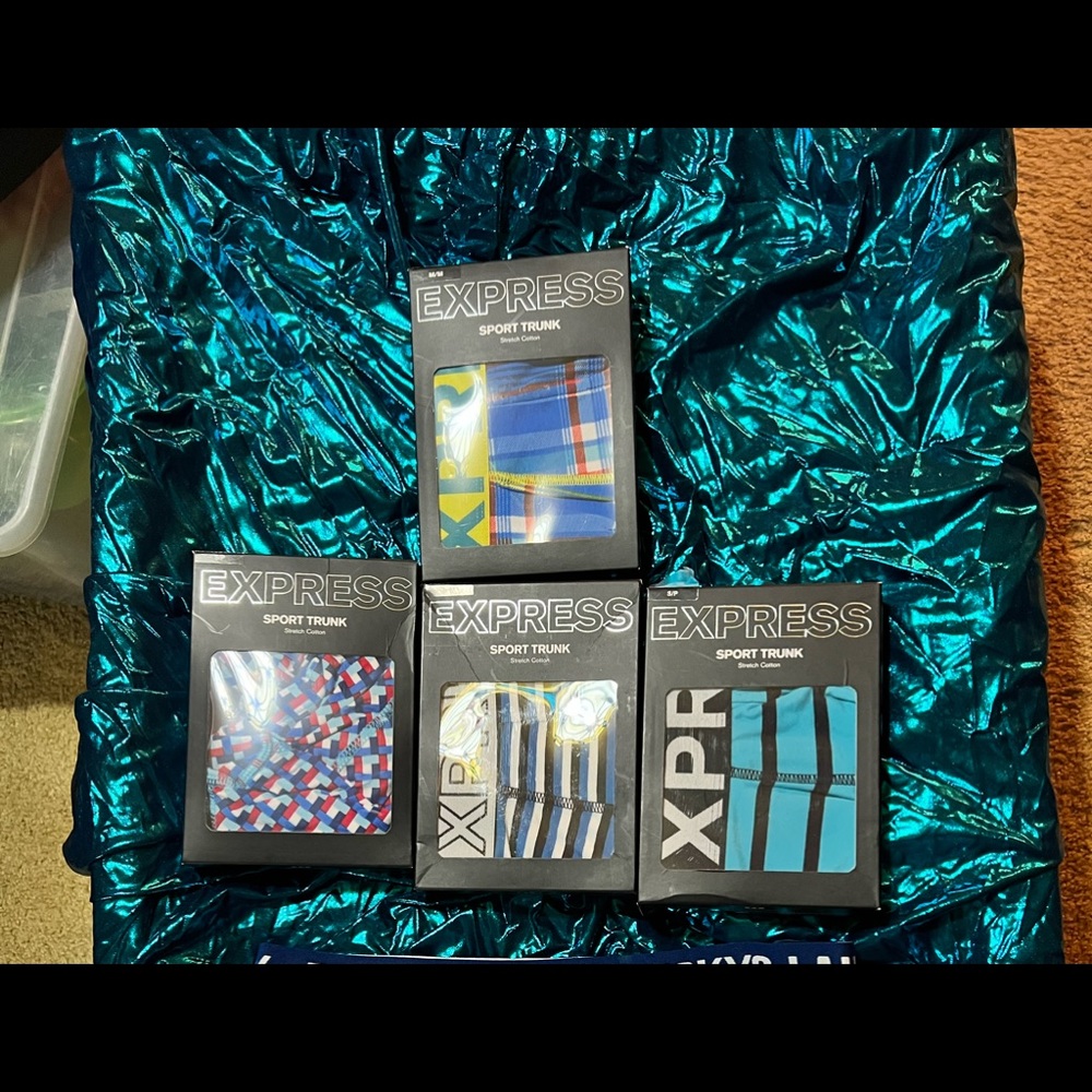 4 Express sport trunks bundle. Too small and two medium